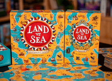 Front covers of the expansion and base game together: forms a panorama from either side.